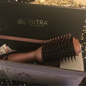 Never used Sutra styling and volumizing hair brush.  Works wonders on long hair